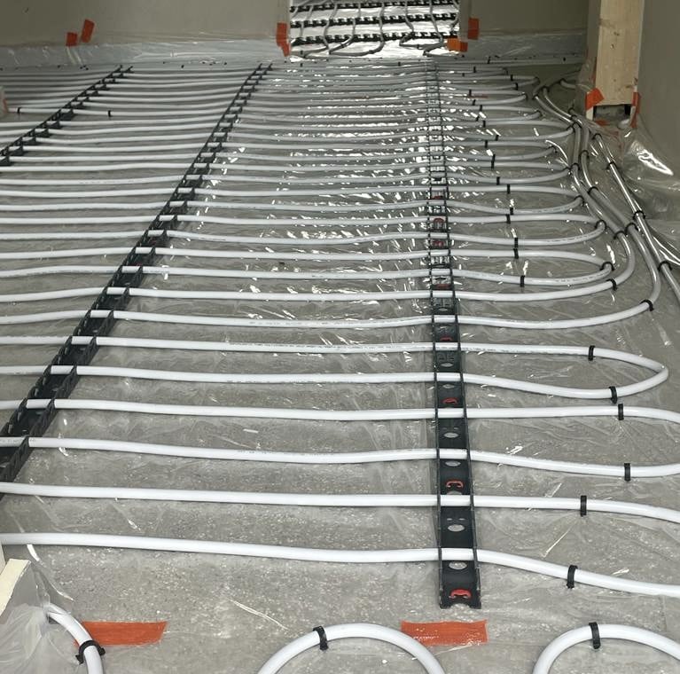 baseTherm® BEPS Liquid Floor Insulation | prepped with polythene and UFH | ready for Fast Floor UFH liquid Screed!