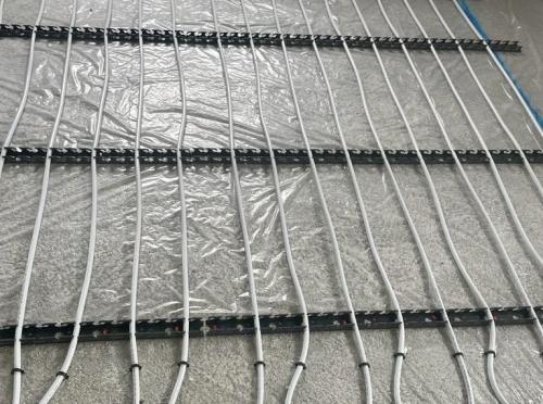 baseTherm® BEPS Liquid Floor Insulation | with UFH and polythene | ready for screed